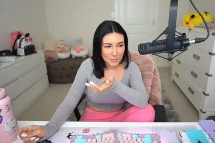 Alinity streaming at her setup during a Twitch stream