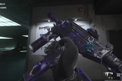 A screenshot of a purple WSP Swarm with fun weapon charm in Warzone's firing range.