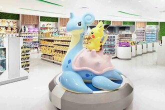 A Lapras and Pikachu statue in a Pokemon Center store.